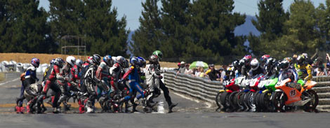 Le Mans Rider Dash Across the Track